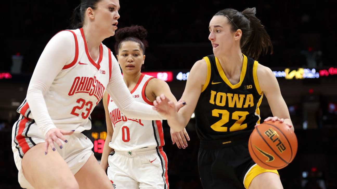 COLUMBUS, OHIO - JANUARY 21: Caitlin Clark #22 of the Iowa Hawkeyes is defended by Rebeka Mikulasikova #23 of the Ohio State Buckeyes during the game at Value City Arena on January 21, 2024 in Columbus, Ohio. Ohio State defeated Iowa 100-92 in overtime. (Photo by Kirk Irwin/Getty Images)